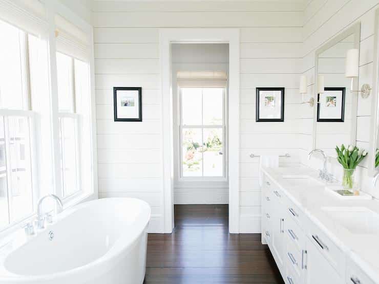 An All-White Bathroom with Grand Fixtures