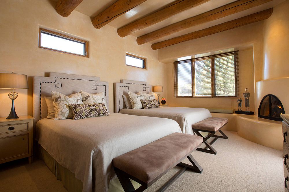 Beautiful-textured-walls-and-lovely-wooden-ceiling-beams-for-the-modern-rustic-bedroom