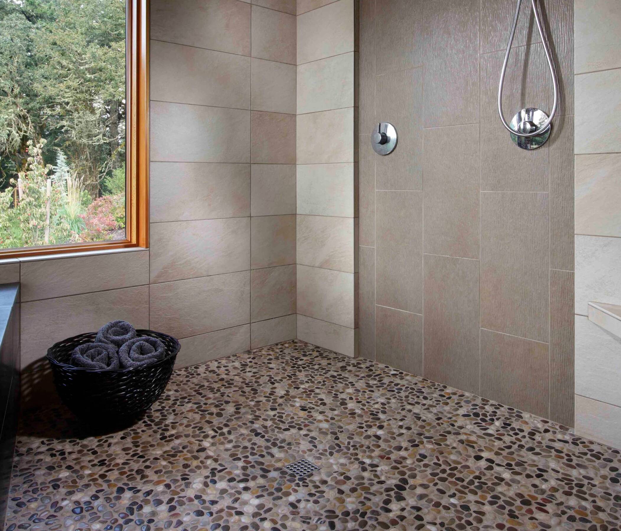 Transitional Pebble Tile Doorless Shower.