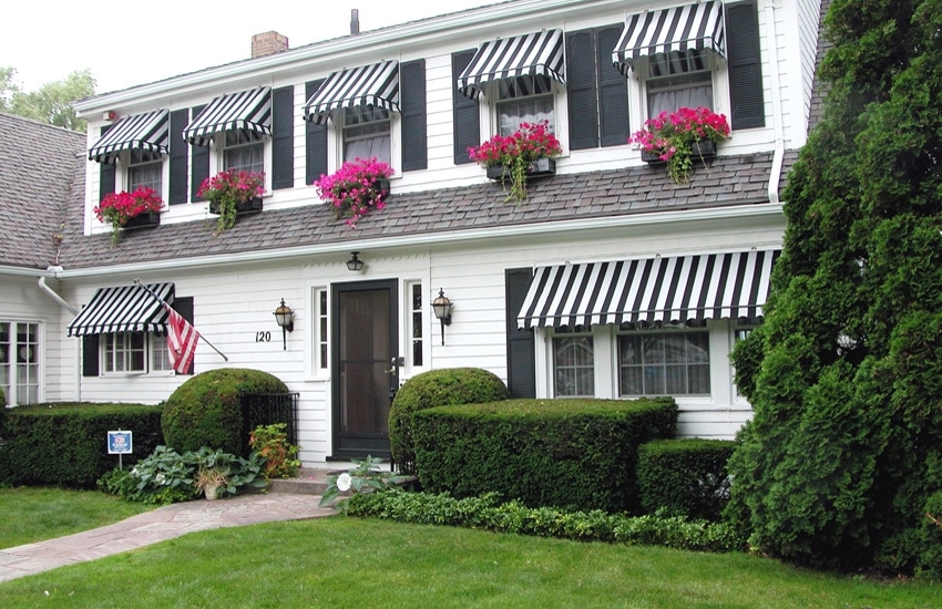 White House with Black Awnings