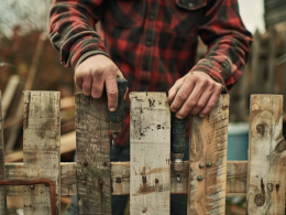 How can you secure a pallet fence?